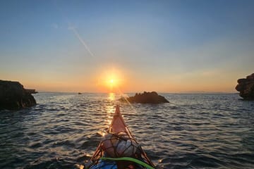 Sunset Kayaking Adventure along Vouliagmeni Coastline