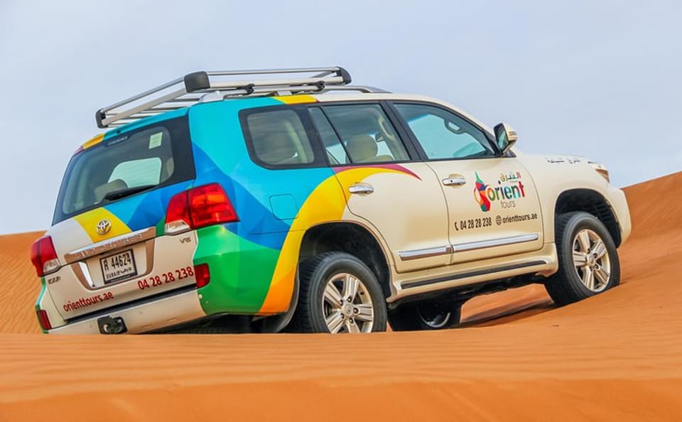 Morning Dubai Desert Safari with Camel Ride and Sandboarding