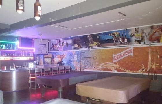 Sports bar Day or Nightlife Experience with Private Transfer