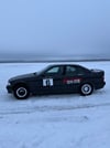 Driving a rally car on an ice track 1h . 3