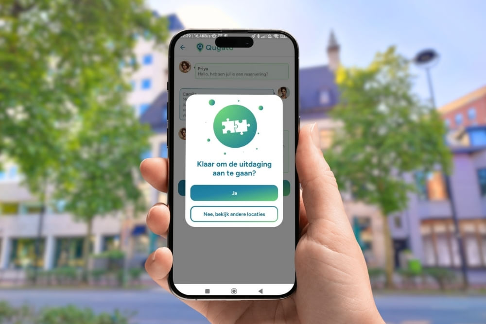 Phone showing the app interface of the Tilburg City Detective game.