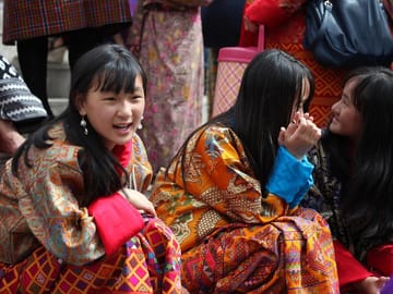 Young girls in the finest national costumes during the festival