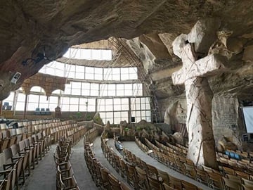 Visit the Cave Church of Saint Simon & Garbage City