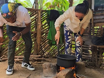 Mastering the art of traditional coffee roasting over an open flame for a truly sophisticated Tanzanian flavor.