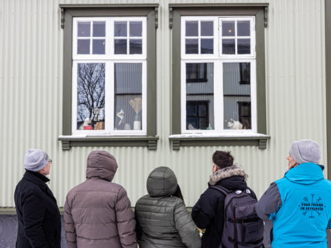 Travellers outside the cat-cafe in Reykjavik