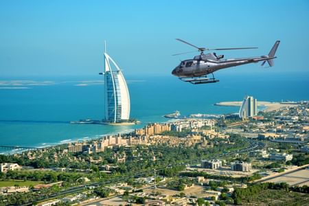 Iconic Dubai Helicopter Ride – 12 Mins tour with Private Transfers