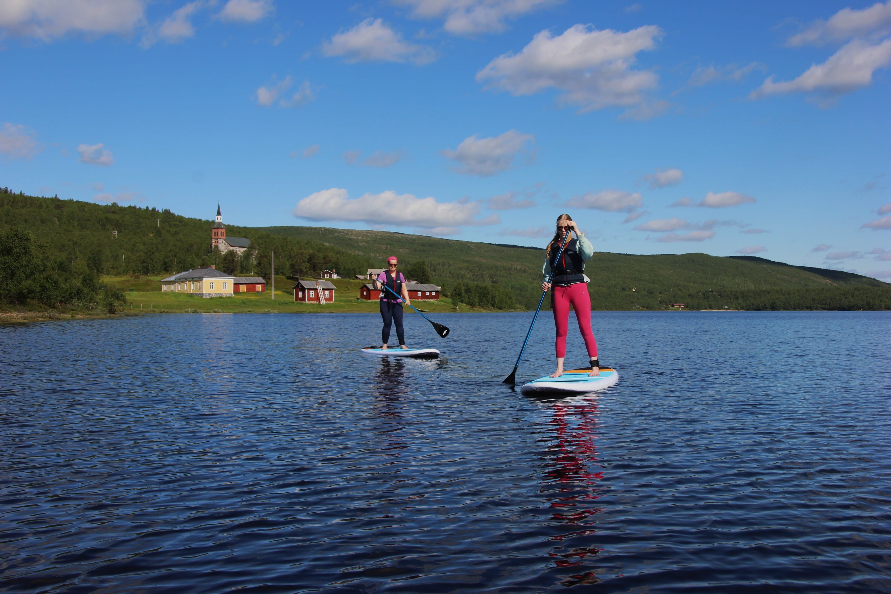 SUP boards Mantojärvi lake summer day in Lapland