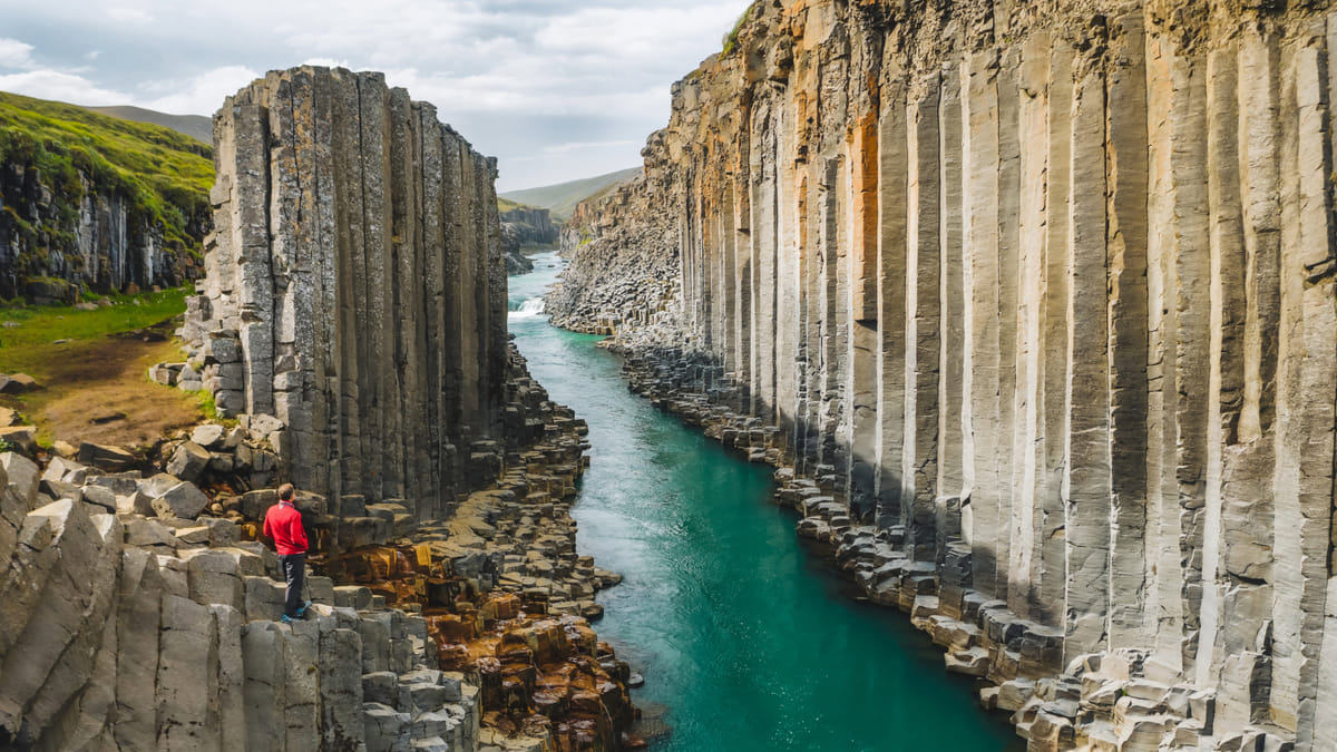Why just visit Iceland when you can explore its hidden wonders? Don’t miss Stuðlagil Canyon.
