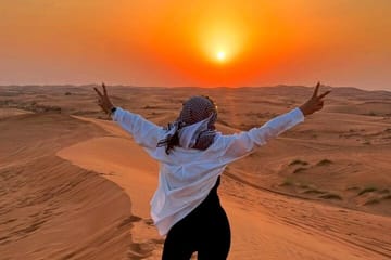 Experience Quad Bike, BBQ Dinner and Live Show in Dubai