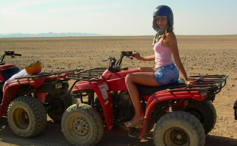 Hurghada Desert ATV Adventure with Dinner and Show
