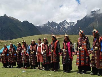 The people of Laya performing traditional dance at local festival