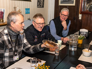 The Guide from Your Friend in Reykjavik giving a closer explanation about the food the guests are consuming.