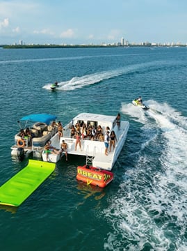3 Hour Party Boat Jet ski Banana Tube and open bar in Miami