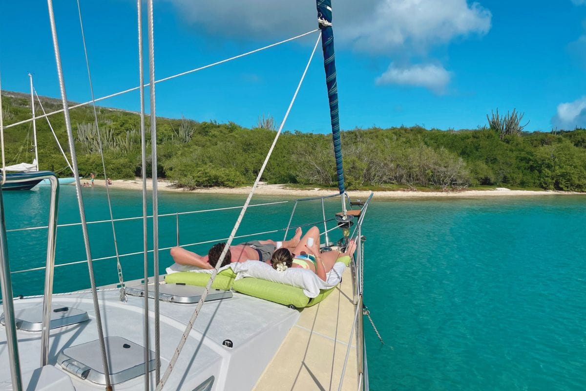 couple enjoying relaxing on sailing yacht galaxie