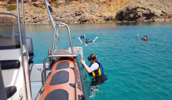 Snorkelling from a speedboat in the Marine Reserve of Menorca
