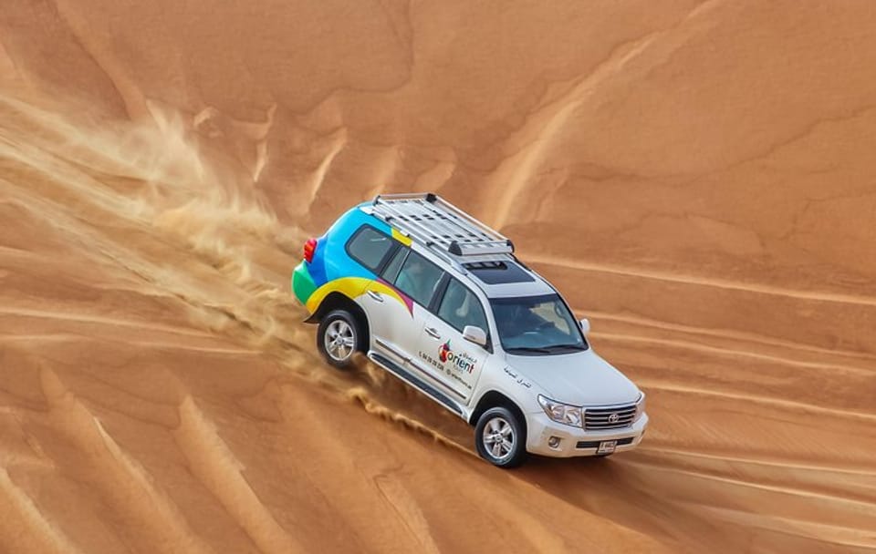 Classic Dubai Desert Safari with BBQ Dinner and Camp activities
