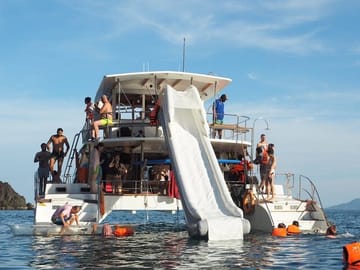 Amazing Coral Island & Sunset Dinner with Power Catamaran