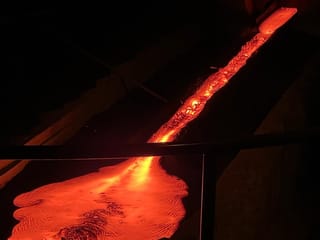Molten lava glowing inside the Lava Show venue, offering visitors a safe and unforgettable encounter with Iceland’s volcanic forces.