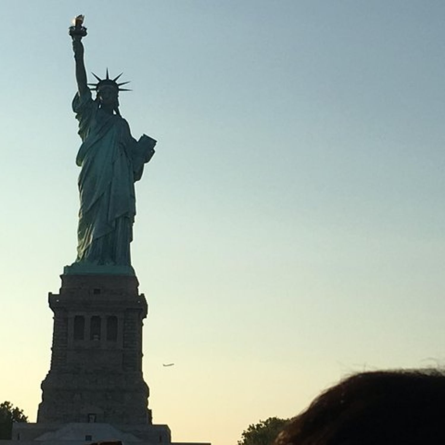 statue of liberty and ellis island ferry