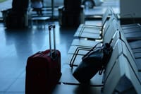 luggage at airport seats