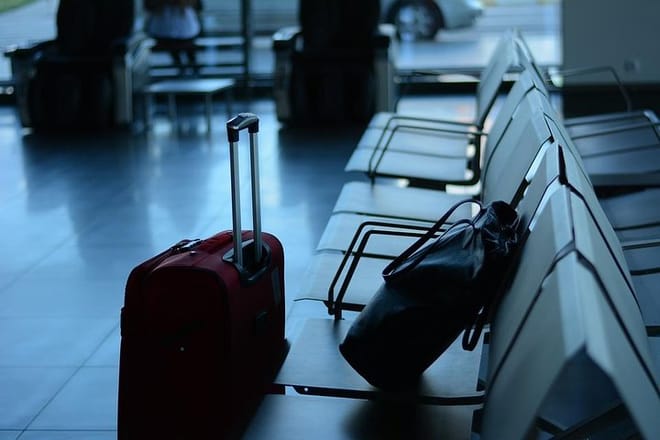 luggage at airport seats