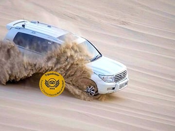 Doha Desert Adventure: Dune Bashing and Camel Riding Tour
