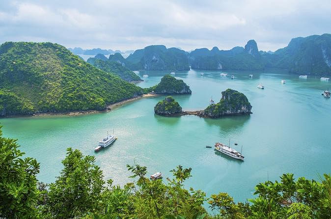 Private Cruise Adventure in Halong Bay: Kayaking, Caves & Sunset Party