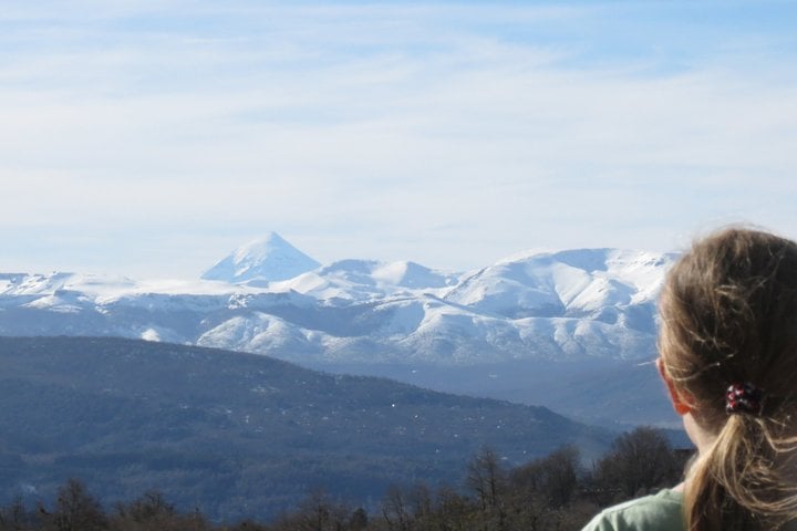 Panoramic view of snow-capped Andes mountains seen during the private 4x4 tour from San Martín de los Andes, Argentina