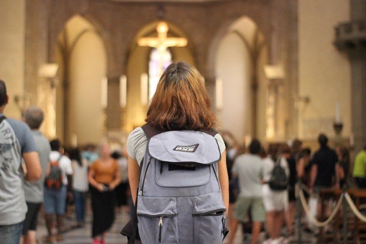 View of a tourist inside the Santa Maria del Fiore Cathedral