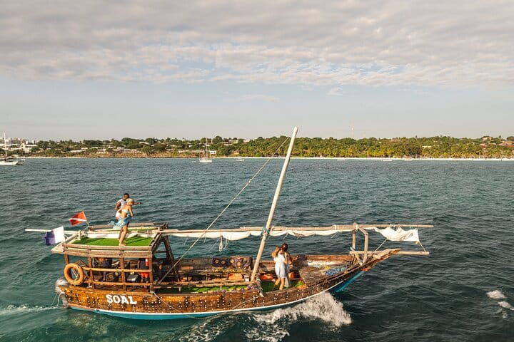 Cruise along Zanzibar’s turquoise waters on a traditional boat, enjoy the ocean breeze, and soak in scenic views of the coastline.