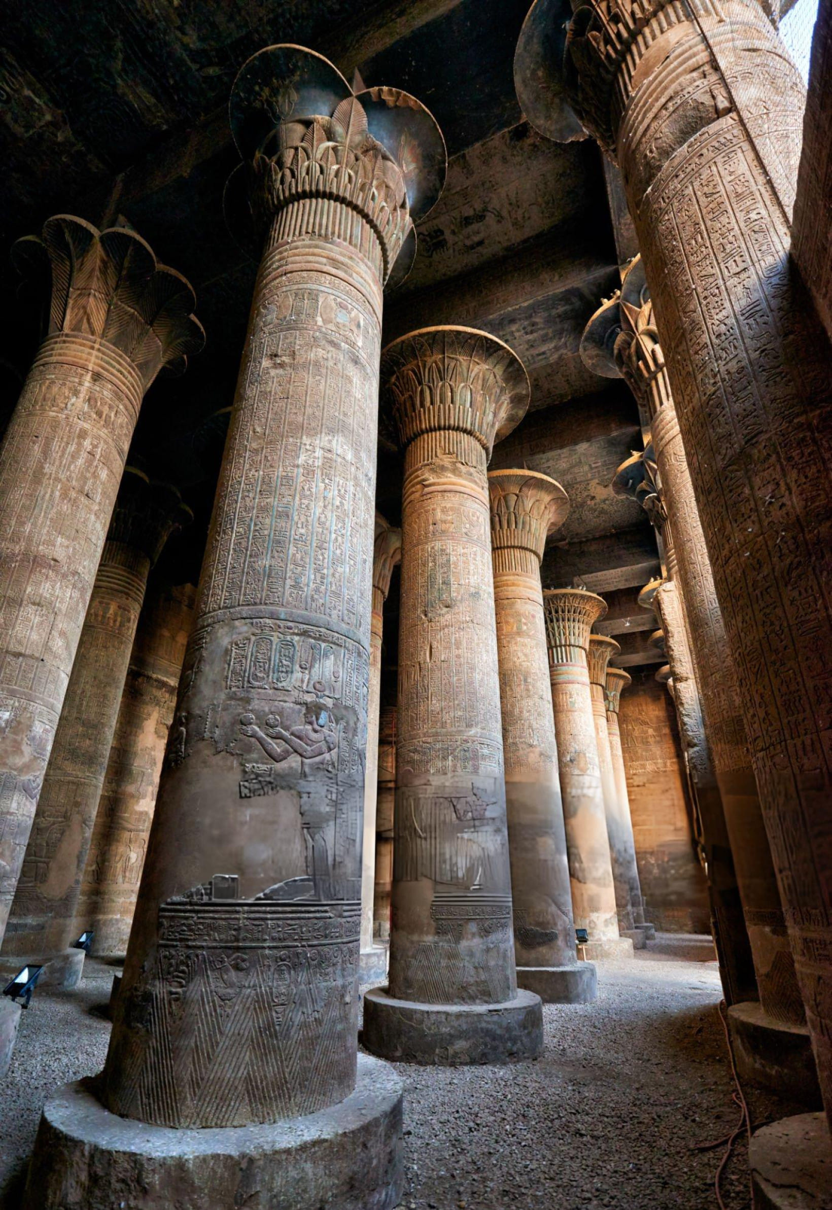Large hypostyle hall inside Esna Temple with decorated columns