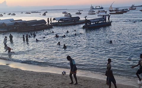 Zanzibar Sunset Dhow Cruise with Snacks and Music from Stone Town