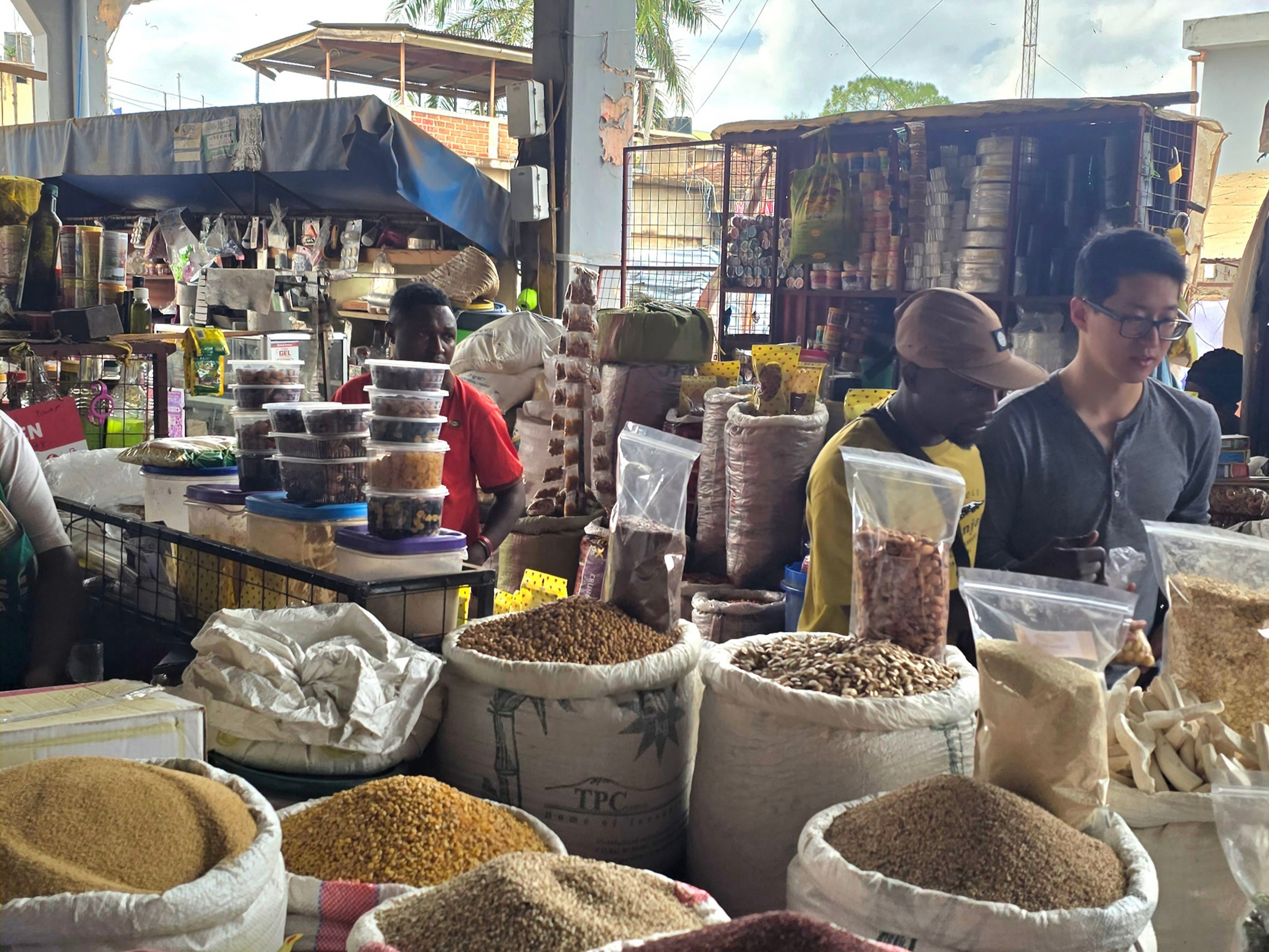 Aromatic East African spices and fresh local produce display in Moshi market