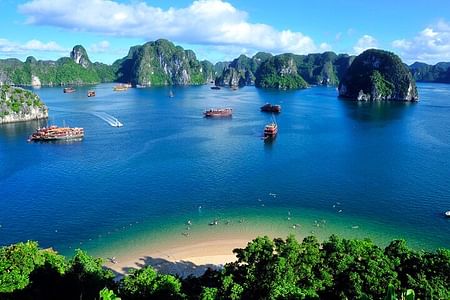 Luxury Ha Long Bay Cruise: Explore Iconic Landscapes & Cultural Performances