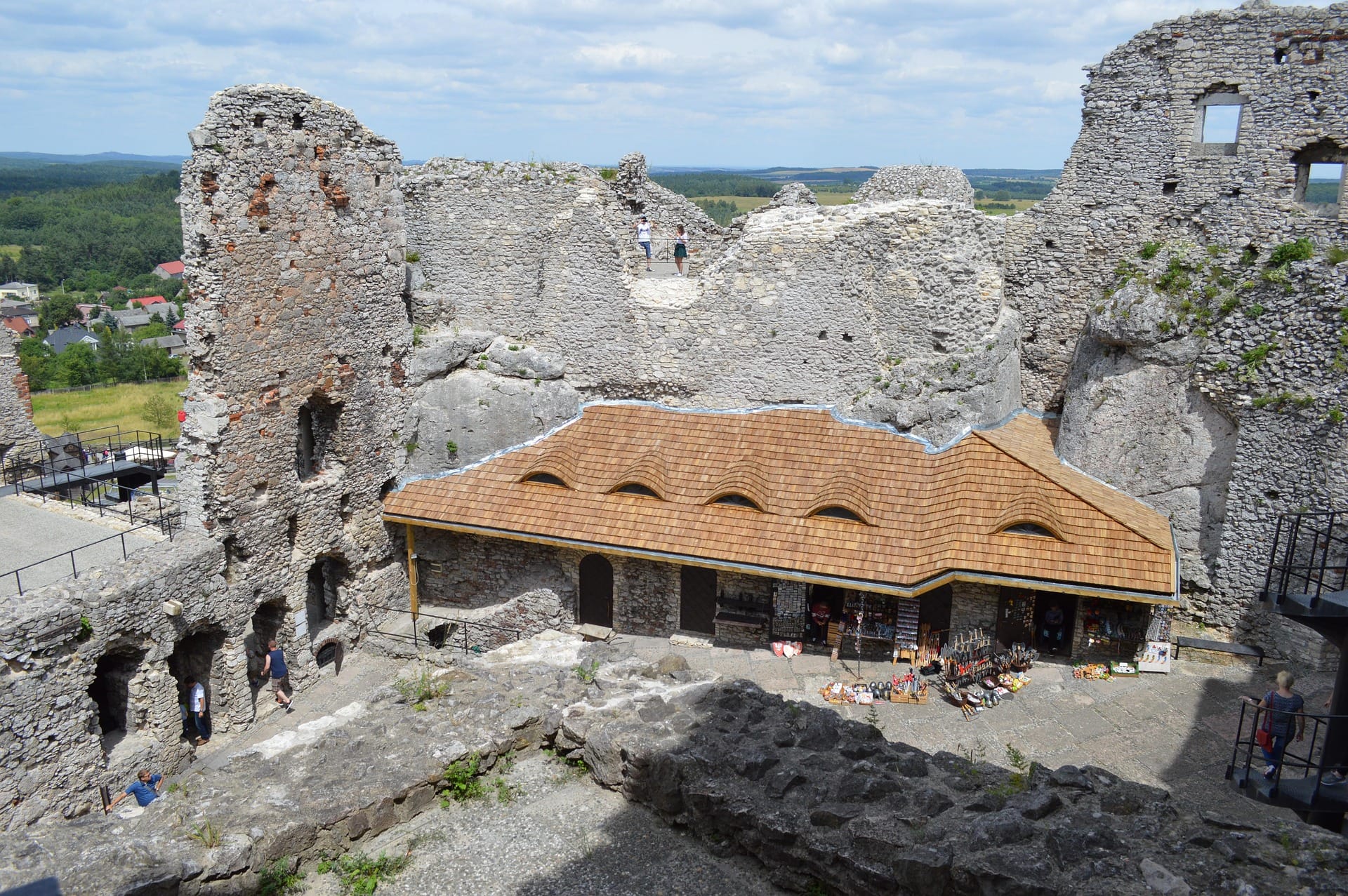 Ogrodzieniec Castle inner courtyard ruins — medieval stone walls and arches