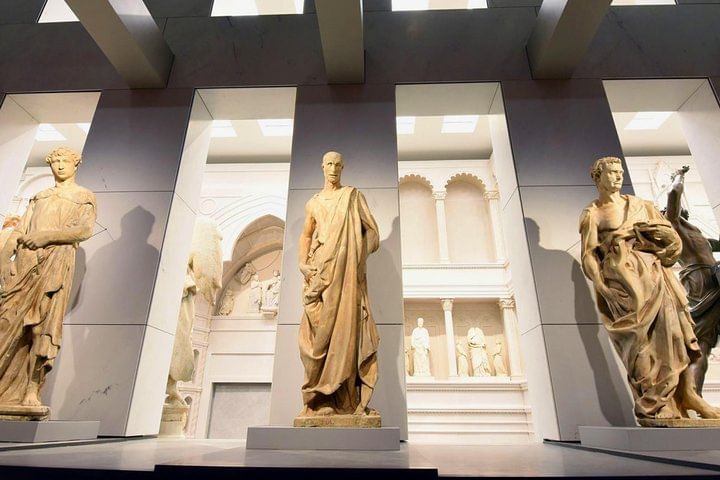 View of one of the halls of the Opera del Duomo Museum with the marble sculpture 