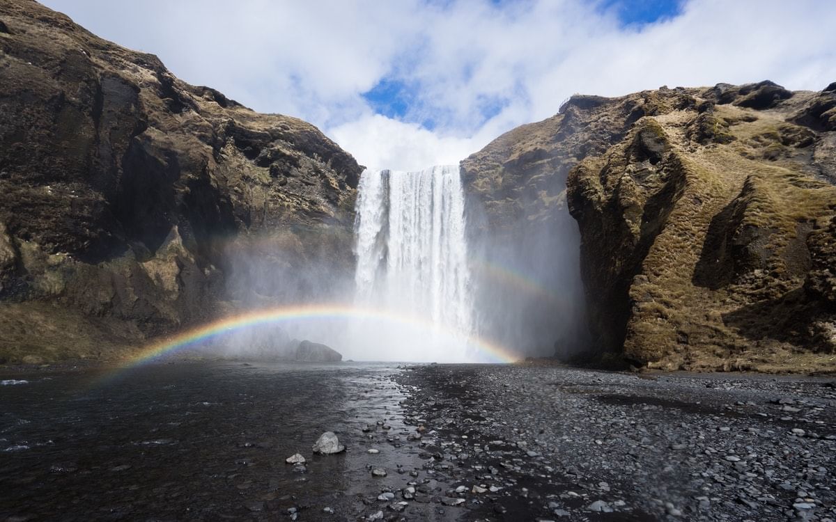 You can see Skógafoss from above by following the pathway next to it