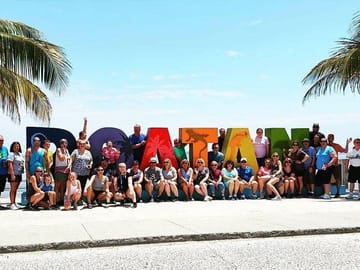 Ideal Group Excursion, Combo Tour: Chocolate Factory, Rum & Cake Tasting, City Tour, Stops for Photos, "Rusty Fish" Market, Roatan Sign and Transportation included