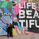 Photo opportunity by one of dozens of art murals on East Fremont Street