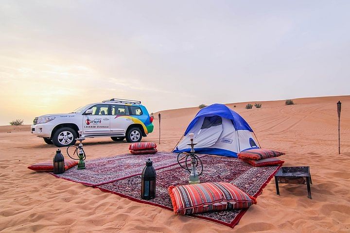 Private Desert Safari: Sandboarding, Camel Ride, BBQ Dinner & Belly Dance