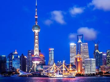 Shanghai Night River Cruise Tour with Xinjiang Style Dining Experience