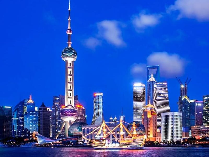 Shanghai Night River Cruise Tour with Xinjiang Style Dining Experience