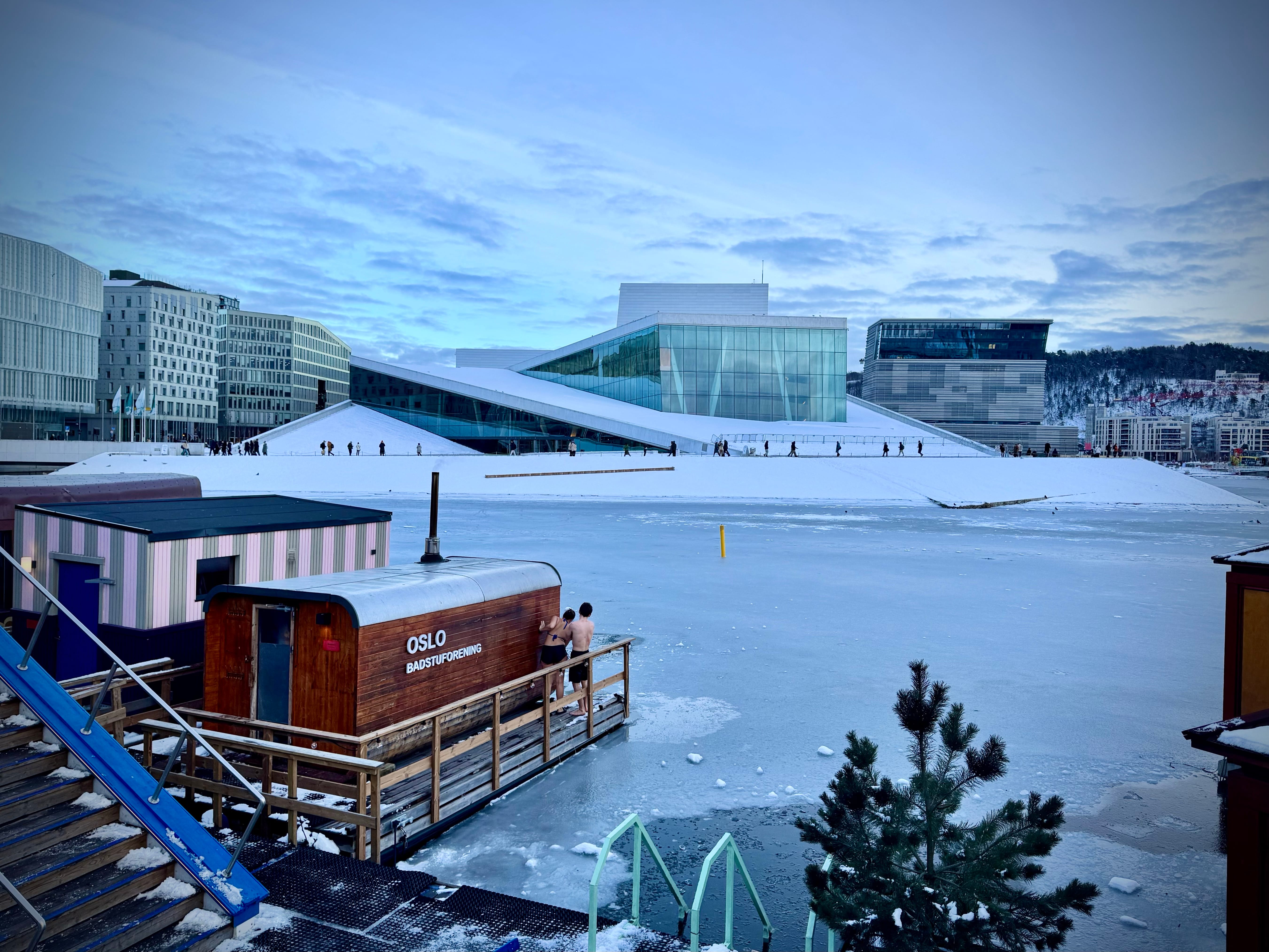 Floating saunas, Opera in background, hole in the ice