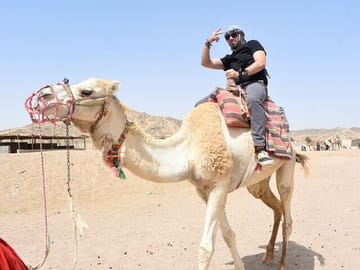 Camel ride on Sahara desert Egypt