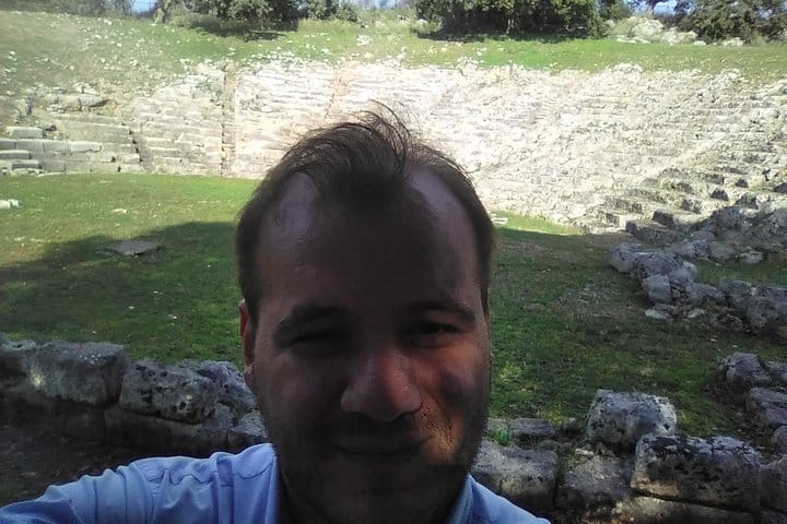 Theodore Guide in The Ancient theater of Oiniades.