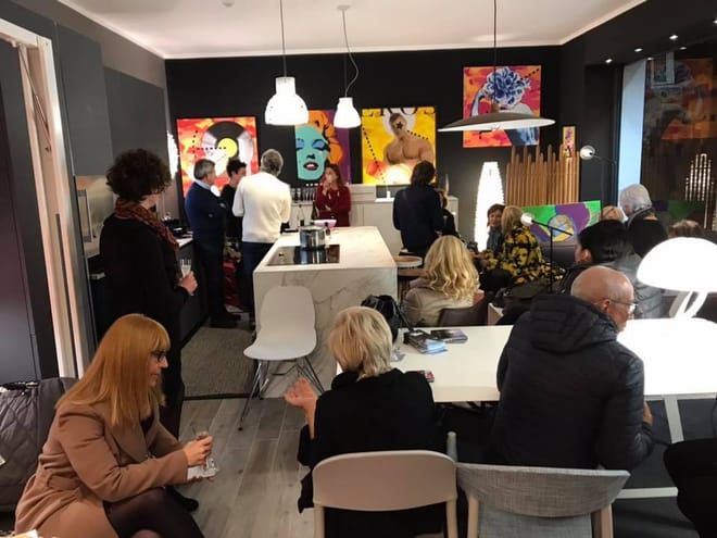 Guests taste wine at Rapino's bsement