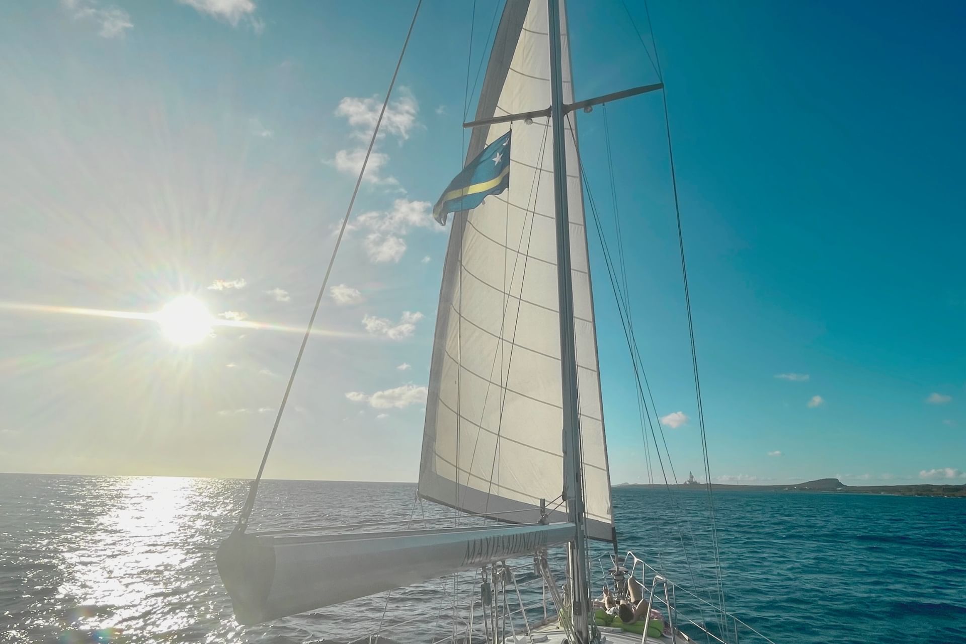 Sailing yacht Galaxie at sunset on Caribbean Sea in Curacao