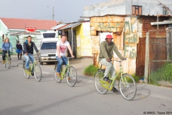 Engage with locals and discover hidden community gems on two wheels.
