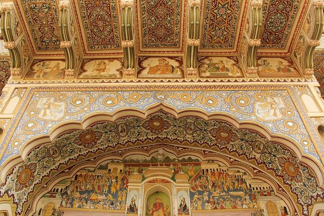 A hand painted fresco with a religious scene is painted on the wall of a Haveli in Mandawa