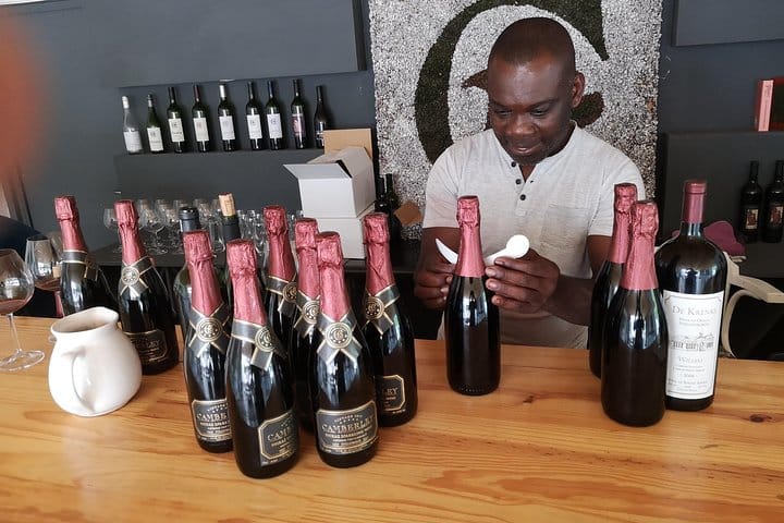 Putting on labels at boutique vineyard
